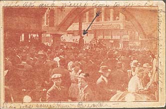 Silhouetted corpse of African American Allen Brooks hanging from Elk’s Arch, surrounded by spectators. March 3, 1910. Dallas, Texas. Tinted lithographed postcard. 3 1/2 x 5 1/2 in.